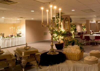 Banquet hall with tables, chairs, candles, food and more in rva