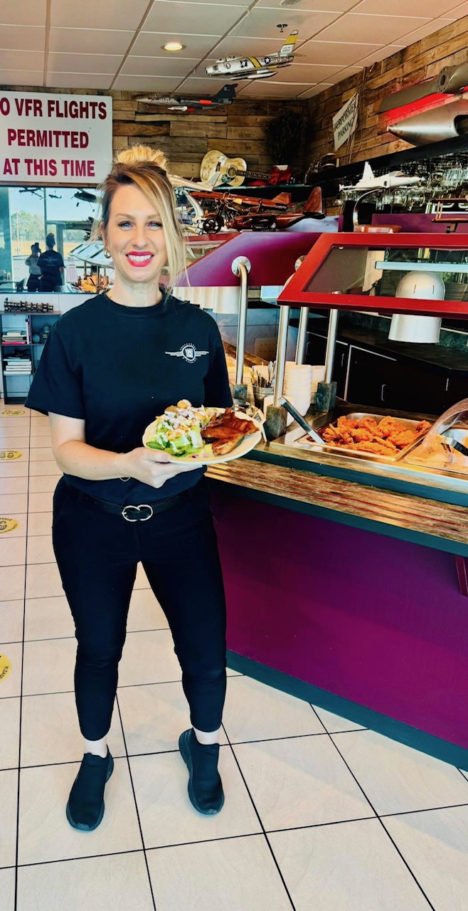 Candace Vaden standing by the King’s Korner buffet line
